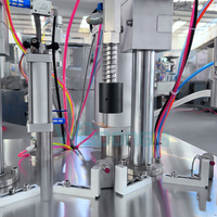 Machine de remplissage d'aérosols semi-automatique haute efficacité avec pompe pour gel de rasage post-mousse et produits en canettes BOV, pour un dosage précis du pétrole.