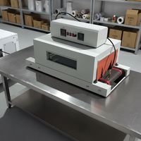 Elektrisch Versiegelte Automatische Schrumpffolienmaschine Geschenkbox Vollautomatische L-förmige Schneidemaschine
