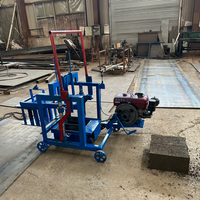 Machine à fabriquer des briques en béton à moteur non automatique haute efficacité avec ciment pour blocs creux et pavés Garantie 1 an