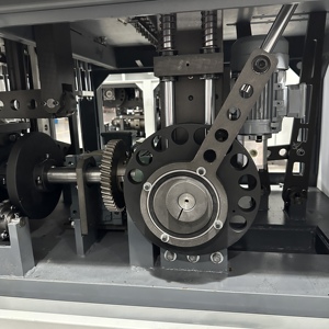 Machine automatique <span class=keywords><strong>de</strong></span> fabrication <span class=keywords><strong>de</strong></span> gobelets en papier jetables Yongbo avec moteur PLC, boîte <span class=keywords><strong>de</strong></span> vitesses et <span class=keywords><strong>pompe</strong></span> - Product Image 2
