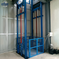 Plateforme élévatrice hydraulique personnalisée pour le levage de marchandises verticales en entrepôt et atelier