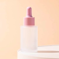Flacon compte-gouttes d'huile essentielle de pompe à sérum en verre de 30ml avec emballage en boîte Cosmétique rond givré personnalisé de luxe