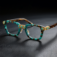 Lunettes en acétate faites à la main OEM avec incrustation turquoise et détails plaqués or, montures de lunettes de luxe pour femmes et hommes