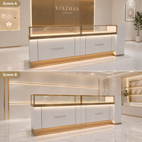 Vitrine de présentation de bijoux YIZHAN YZ-85 de luxe, personnalisable, blanche/dorée, avec éclairage LED et miroir au dos, forme trapézoïdale pour