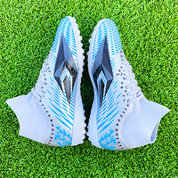 Chaussures de football d'été personnalisées en gros à prix abordable, à tige haute, semelle intermédiaire en EVA, semelle extérieure en PVC, unisexe