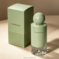 Flacon de parfum cylindrique en verre luxueux, vert, avec bouchon rond en forme de boule, base en forme de montagne, boîte et bouchon personnalisés