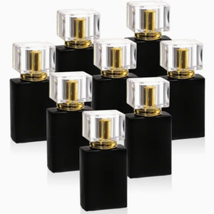 Botella de perfume de 30 ml, subenvasada en frasco de vidrio negro mate con tapón de rosca. - Product Image 1