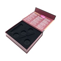 Boîte cadeau magnétique en carton noir de luxe, en forme de livre, avec doublure en éponge, emballage haut de gamme, fond beige clair, laminage mat