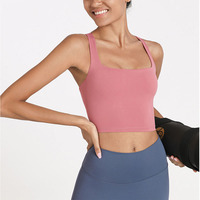 Soutien-gorge de sport athlétique pour femme, effet seconde peau, coupe longue, bretelles croisées, rembourré, couleur unie, pour l'entraînement, la gym, le yoga et la course