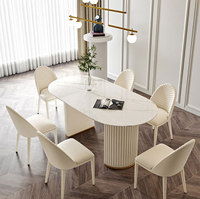 Ensemble table et chaises de salle à manger de luxe léger, moderne, simple, ovale, couleur crème, avec plaque de roche