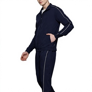 Ensemble de survêtement blanc personnalisé avec fermeture éclair intégrale, veste de survêtement à col montant et fermeture éclair contrastante orange, et pantalon de jogging - Product Image 4