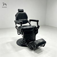 Fauteuil de barbier ergonomique de luxe noir et or EaseNeat, inclinable hydrauliquement, pivotant à 360°, avec structure métallique