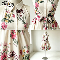 Robe mini trapèze personnalisée OEM à imprimé floral, col halter et ceinture, pour femme, vente en gros directe d'usine, marque privée