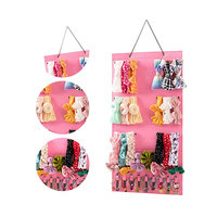 Organisateur de rangement mural pliable en feutre pour bébés filles porte-arcs de cheveux avec bandeau pour le stockage et le nettoyage des bijoux