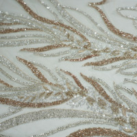 Tissu en peluche tricoté de trame soluble dans l'eau en spandex/nylon de poids moyen de luxe paillettes brodées pour tube transparent extensible de mariage