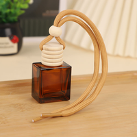Nouveau diffuseur d'air pour voiture en verre mat de luxe, diffuseur d'air suspendu avec corde, flacon de parfum givré, bois de couleur mélangée