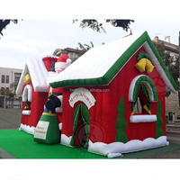 Maison de Noël gonflable personnalisée commerciale de sortie d'usine maison de la grotte du père noël avec lumière led pour la décoration de fête