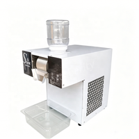 Machine à glace pilée électrique commerciale 220V 1300W haute productivité pour les magasins de boissons et les cafés