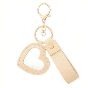 Espejo Compacto de Cuero PU con Forma de Corazón y Diseño de Litchi, Llavero con Espejo de Viaje Plegable Giratorio de Doble Cara - Product Image 1