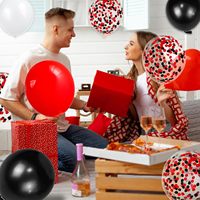 Ensemble de ballons en latex noir et rouge pailletés pour la décoration de fête