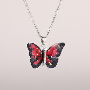 Colgante de Mariposa en Plata 925 con Baño de Rodio, Alas Rojas y Negras con Incrustaciones de Diamantes de Imitación, Estilo Romántico Unisex para Uso Diario - Product Image 1