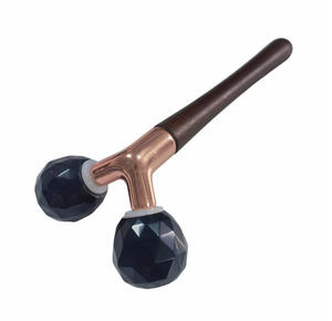 Rodillo de jade de doble cabezal en forma de Y, de color negro, multifacético, para uso doméstico, para lifting facial. - Product Image 1
