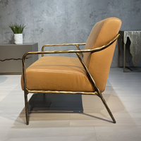 Fauteuil de loisirs individuel en fer forgé massif de style Mid-Century, avec revêtement en cuir ciré rétro et structure en métal forgé à la main