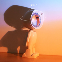 Projecteur de coucher de soleil Robot lumière d'ambiance intérieure Led veilleuse arc-en-ciel projecteur de coucher de soleil Robot astronaute lampe de nuit accessoires Photo