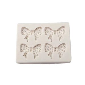 Moule en silicone DIY pour nœud papillon en pâte à sucre, idéal pour la décoration de gâteaux et la création de pinces à cheveux - Product Image 6