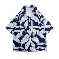 Chemise hawaïenne kaki d'expédition de photographie pour hommes à la mode avec des impressions d'objectif de caméra pour des safaris photo africains
