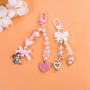 Llavero de moda para mujer con colgante creativo para teléfono móvil y cadena decorativa, estilo INS, novedoso y atractivo. - Product Image 3
