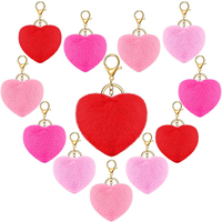 Vente en gros de porte-clés boule de fourrure d'amour en peluche coeur de pêche pendentif de sac imprimé léopard en forme de coeur pompons porte-clés