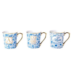 Tasses à café personnalisées en céramique bleue à fleurs, faites à la main, avec poignée dorée, pour maman - Product Image 1