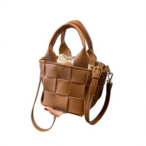 Nouveau style tendance : Sac à main bandoulière rétro pour femme, style coréen, tissé, petit format, avec fermeture éclair unique, design original, couleur Tanjing - Product Image 1