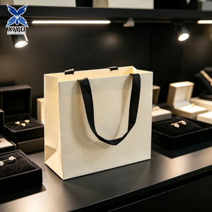 Sac cadeau <span class=keywords><strong>de</strong></span> luxe en papier ivoire beige Off-White avec poignée en ruban pour l'emballage <span class=keywords><strong>de</strong></span> <span class=keywords><strong>vêtements</strong></span>, les boutiques et les fêtes <span class=keywords><strong>de</strong></span> mariage - Product Image 1