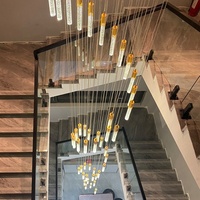 Lustre long en cristal de luxe, luminaire suspendu moderne avec tiges en verre pour villa, escalier, salon, hall d'hôtel, décoration