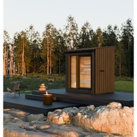 Sauna extérieur en bois de cèdre rouge massif, très demandé, avec toit en pente, verrière panoramique et poêle électrique pour jardin familial