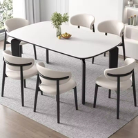 Ensemble table et chaises de salle à manger en dalle de roche, plateau en dalle de roche, pieds en acier carbone, 6 places, style italien, luxe léger, mobilier moderne pour salle à manger