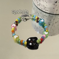 Bracelet perlé pour femme motif tête de chat de dessin animé, mignon et enfantin, noir et blanc