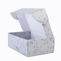 Carton d'expédition robuste avec impression florale élégante sur toute la surface, impression personnalisée pour l'expédition et l'emballage de produits e-commerce