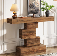 Console d'entrée moderne style ferme avec base géométrique et éléments métalliques, design bois à motifs de livres pour salon et appartement