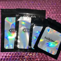 Bolsa de Embalaje Cosmética con Cierre Hermético, Transparente por un Lado, Impresa Personalizada al por Mayor, con Cierre de Cremallera Holográfico
