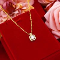 Vente en gros : Nouveauté de la mode, ensemble de bijoux de luxe en alliage plaqué or 18 carats, design de créateur, incrusté de zircon, collier, boucles d'oreilles et bague, unisexe