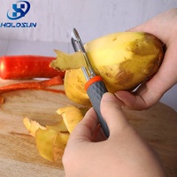 Alat dapur pengupas apel Manual, gadget dapur ramah lingkungan baja tahan karat dengan pegangan silikon untuk alat buah & sayuran