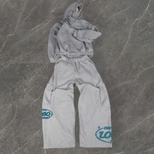 Conjunto Deportivo para Hombre con Sudadera Holgada de Algodón Grueso y Pantalones Deportivos, con Bolsillos Laterales y Hombros Caídos - Product Image 1