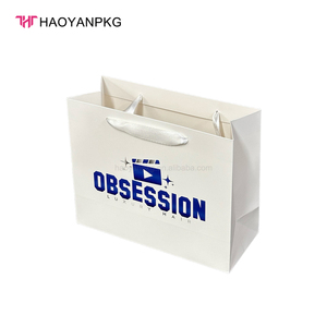 Sang Trọng Màu Xanh Lá Cây Vật Liệu Tái Chế Biểu Tượng Tùy Chỉnh Dập Quần Áo Mua Sắm Túi Giấy Xử Lý Nhà Máy Giá Món Quà Hoàn Hảo Túi Giấy - Product Image 3