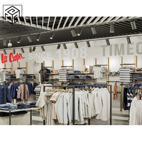 Marque de luxe personnalisée Décoration de magasin de vêtements Boutique tendance Boutique de vêtements Présentoir de design d'intérieur Moderne et écologique