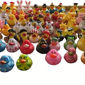 Custom Pvc Plastic Mini Bulk Logo Floating Small Baby <b>Bath</b> Toy Yellow Rubber Duck - Product Image 1