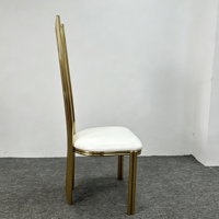 Chaises empilables commerciales en acier inoxydable doré à dossier haut avec coussin blanc pour événements et mariages (vente en gros)