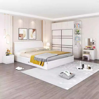 Ensembles de meubles de chambre modernes et économiques : lit de rangement avec tables de chevet, armoire coulissante et coiffeuse pour appartement studio